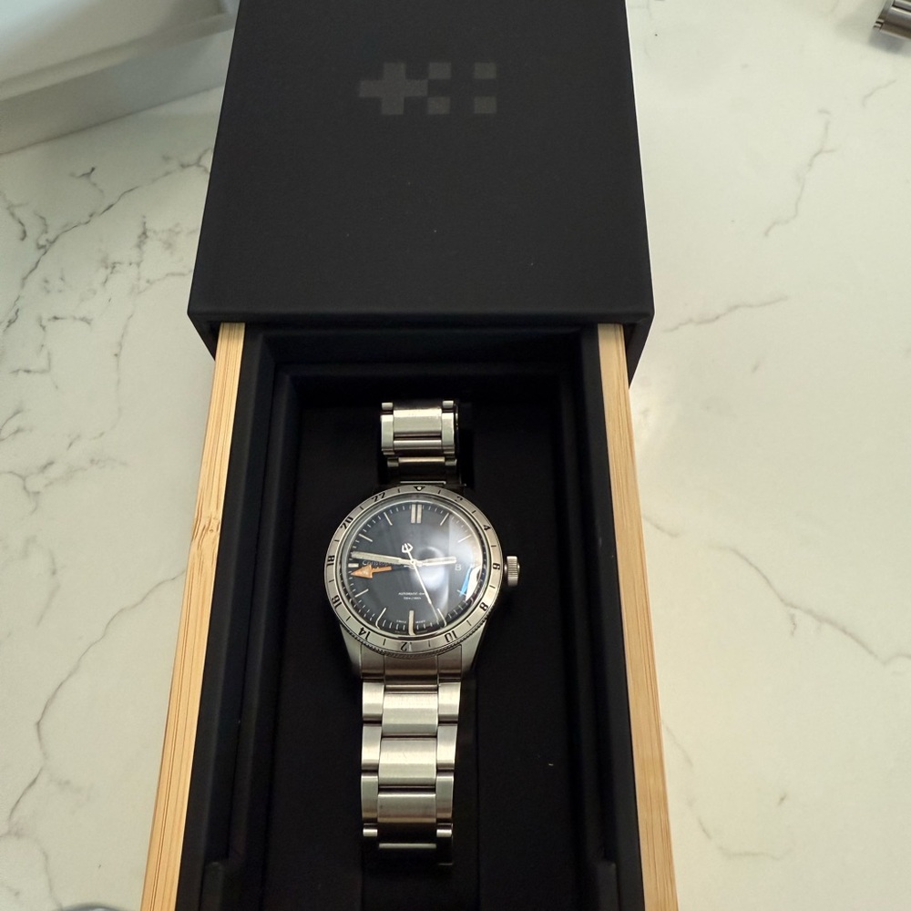 Silver Watch with Black Dial